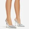 EGO Cruela Lace Up Bow Diamante Stud Detail Pointed Toe Slingback Metallic Stiletto Heel In Silver Faux Leather