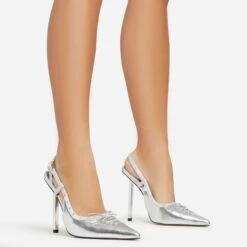 EGO Cruela Lace Up Bow Diamante Stud Detail Pointed Toe Slingback Metallic Stiletto Heel In Silver Faux Leather
