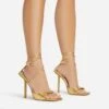 EGO Pamela Lace Up Strappy Square Peep Toe Stiletto Heel In Gold Faux Leather
