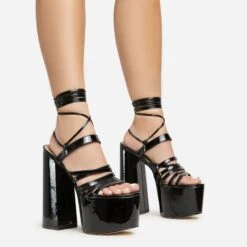 EGO Amazoness Lace Up Extreme Strappy Detail Platform Block Heel In Black Patent