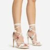 EGO Flower-Child Lace Up Strappy 3D Flower Detail Square Toe Stiletto Heel In White Faux Leather