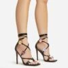EGO Flower-Child Lace Up Strappy 3D Flower Detail Square Toe Stiletto Heel In Black Faux Leather