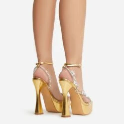 EGO Show-Ahead Clear Perspex Strap Diamante Detail Platform Flared Block Heel In Gold Faux Leather -EGO shop 22 09 22 fwbags0205 sq