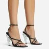 EGO Cadence Strappy Square Toe Metallic Lighting Bolt Statement Heel In Black Faux Leather