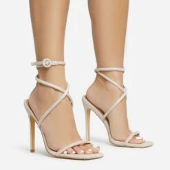 EGO Lena-Olin Cross Ankle Strap Square Toe Stiletto Heel In Nude Faux Suede