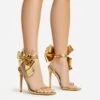 EGO Beau Oversized Bow Detail Square Toe Stiletto Heel In Gold Faux Leather