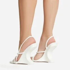 EGO Thriller Strappy Detail Square Toe Sling Back Cut Out Wedge Heel In White Faux Leather -EGO shop 30 11 22 fw39902 sb