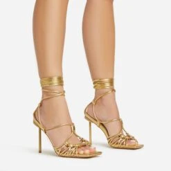 EGO Tour Lace Up Knotted Strap Cage Detail Square Toe Thin Stiletto Heel In Gold Metallic Faux Leather