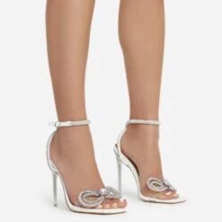 EGO Sugar-Coated Diamante Bow Detail Square Toe Clear Perspex Heel In White Faux Leather
